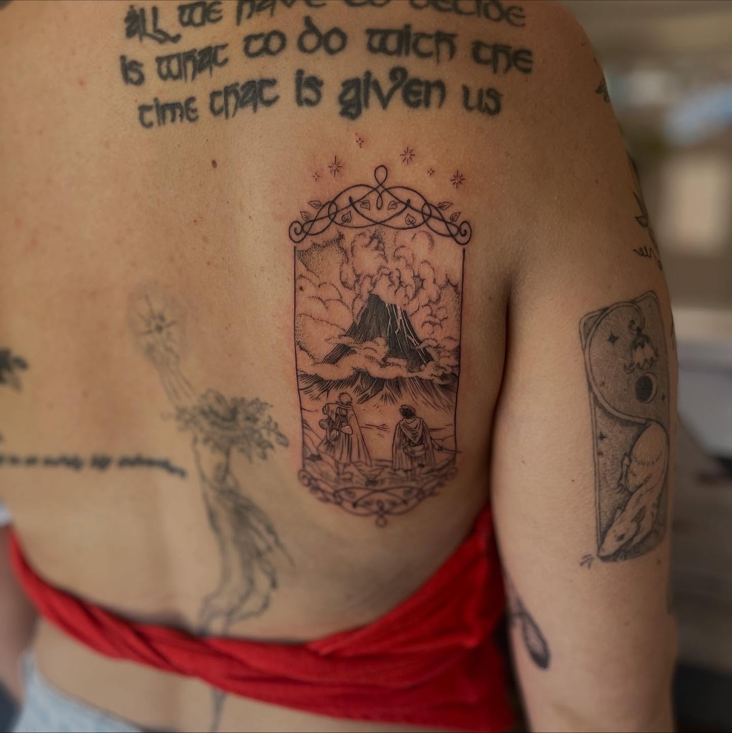 Volcano eruption black and grey tattoo on the shoulder by Ally Easter, Berkeley, California