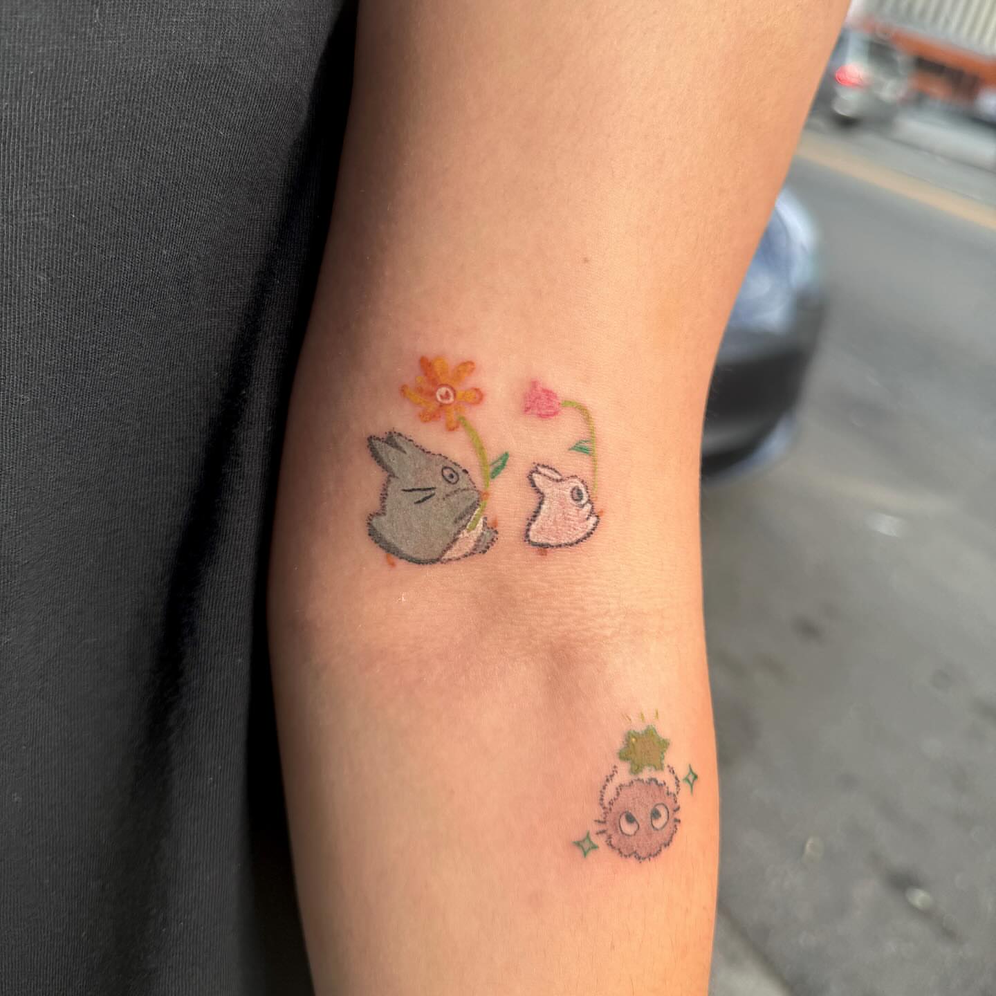 Totoro and Chu Totoro dotwork tattoo on the forearm by Yez tattoo