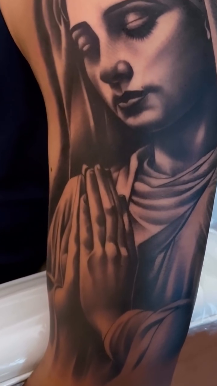 The Virgin Mary praying realism tattoo by TattooBoyTattoos