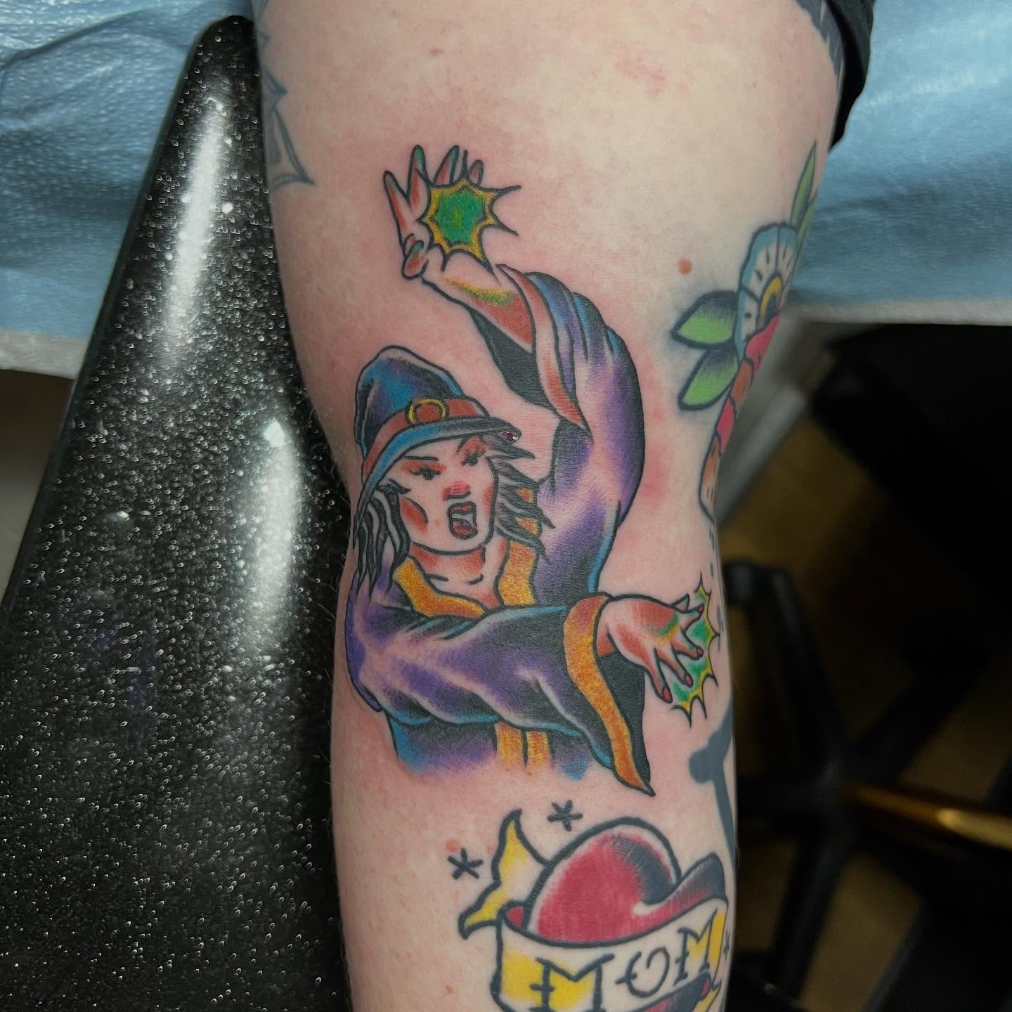 Wizard casting spell American traditional tattoo on the forearm by doodle