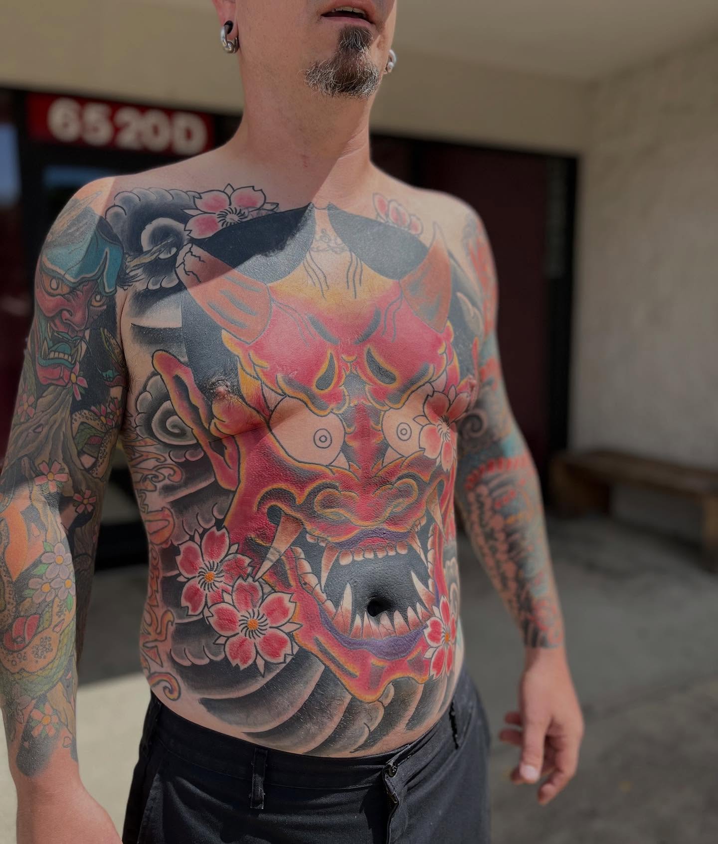 Demon mask with flowers japanese irezumi tattoo on the chest by CRAIG B⛓️ Cincinnati Tattoo Artist