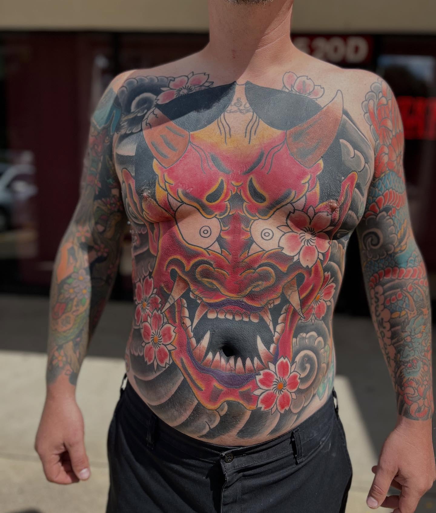 Demon mask japanese irezumi tattoo on the chest by CRAIG B⛓️ Cincinnati Tattoo Artist