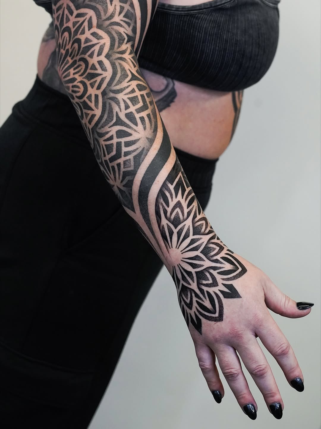 Tattoo by @rjxdots — geometric, dotwork