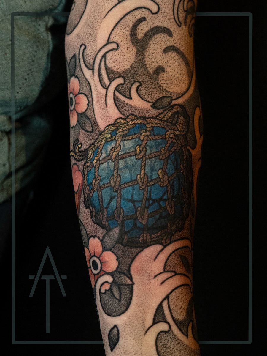 Bomb grenade dotwork tattoo on the forearm by Chris Dobransky