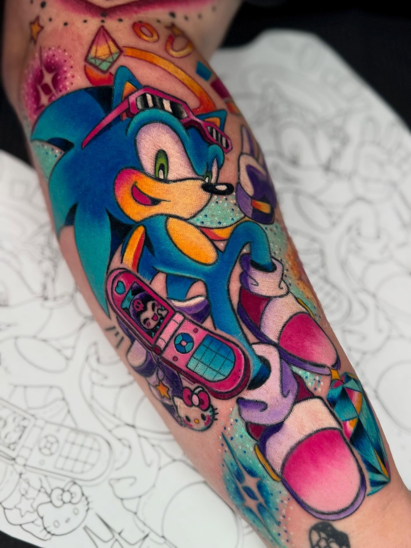 Sonic the Hedgehog new school tattoo on the forearm by Brianna Dickson