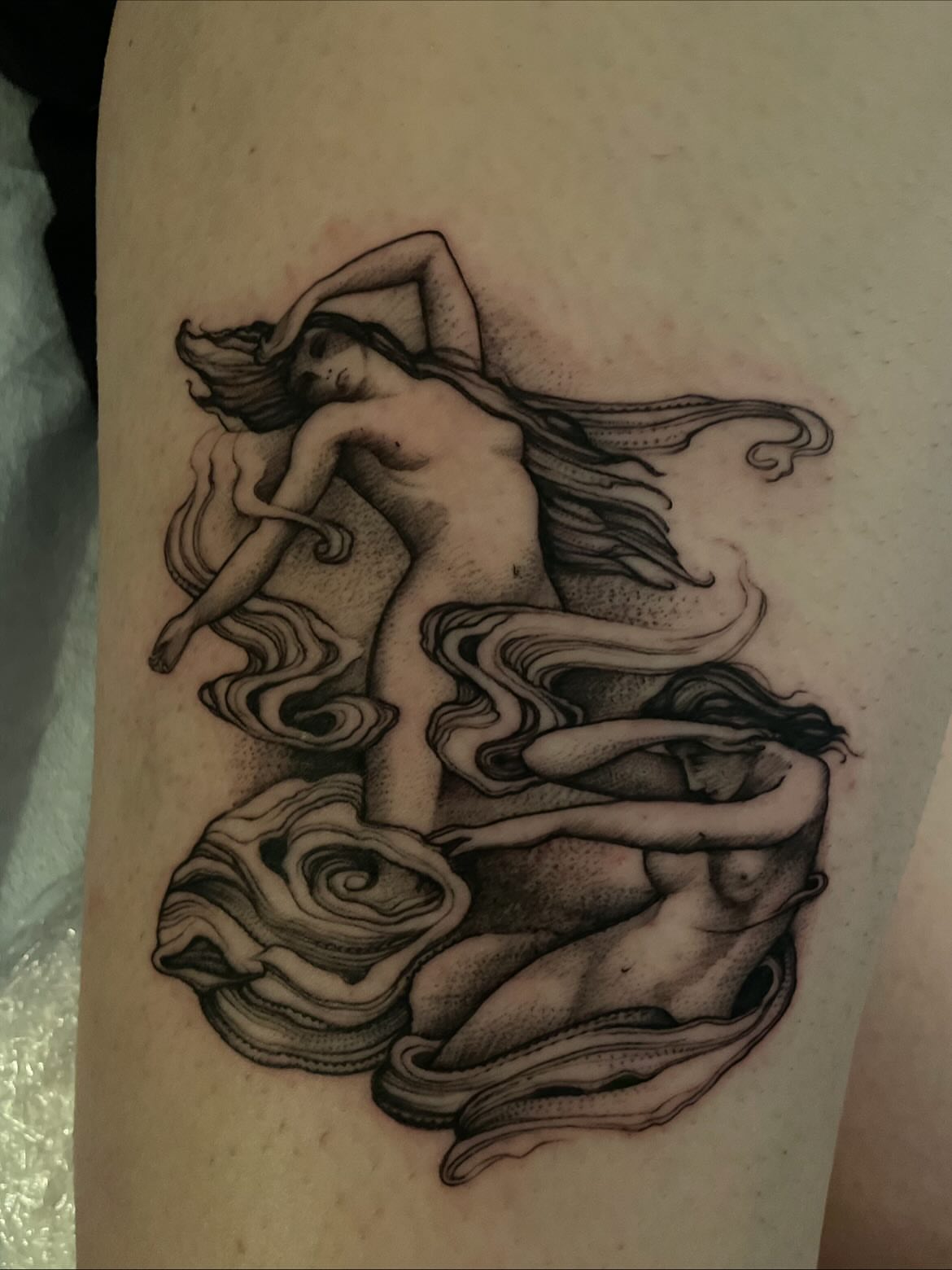 Nude woman with roses dotwork tattoo on the forearm by Jacob Kearney