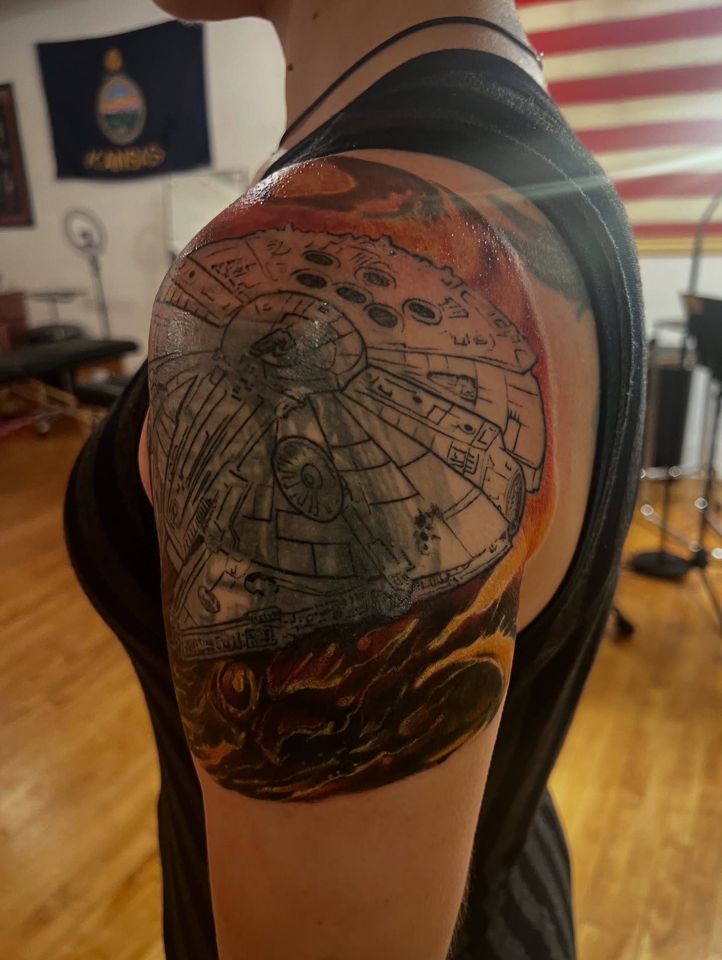 Millennium Falcon realism tattoo on the shoulder by steven