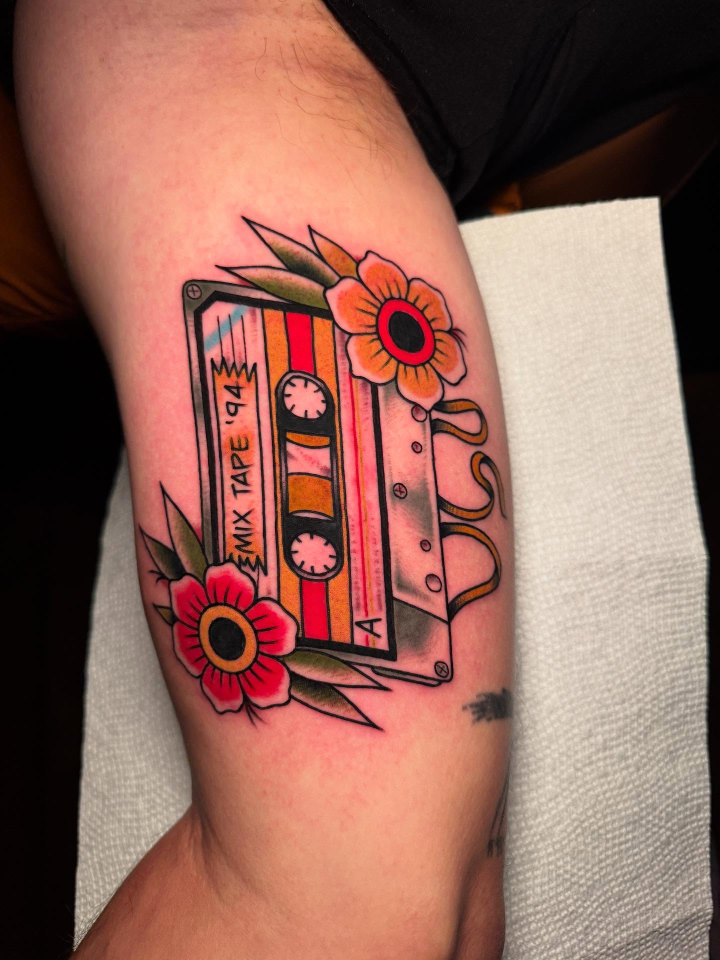 Mix tape American traditional tattoo on the forearm by ๐ท๐๐๐๐ ๐ฎ๐๐๐๐