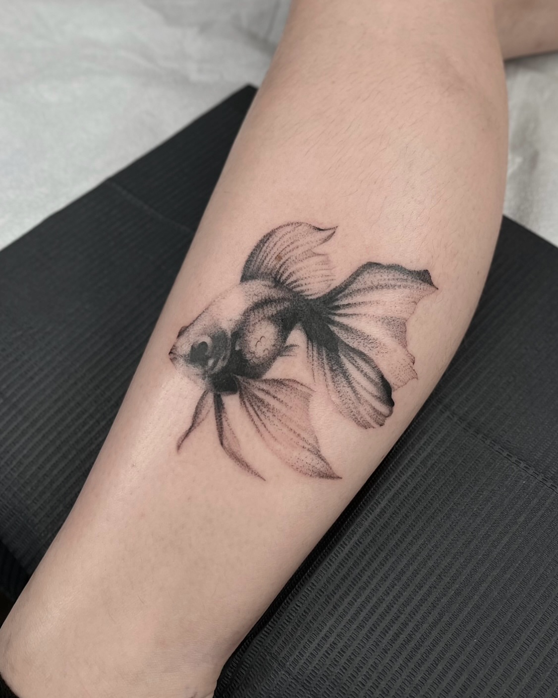 Goldfish dotwork tattoo on the forearm by ✩gracie ⋆｡°✩