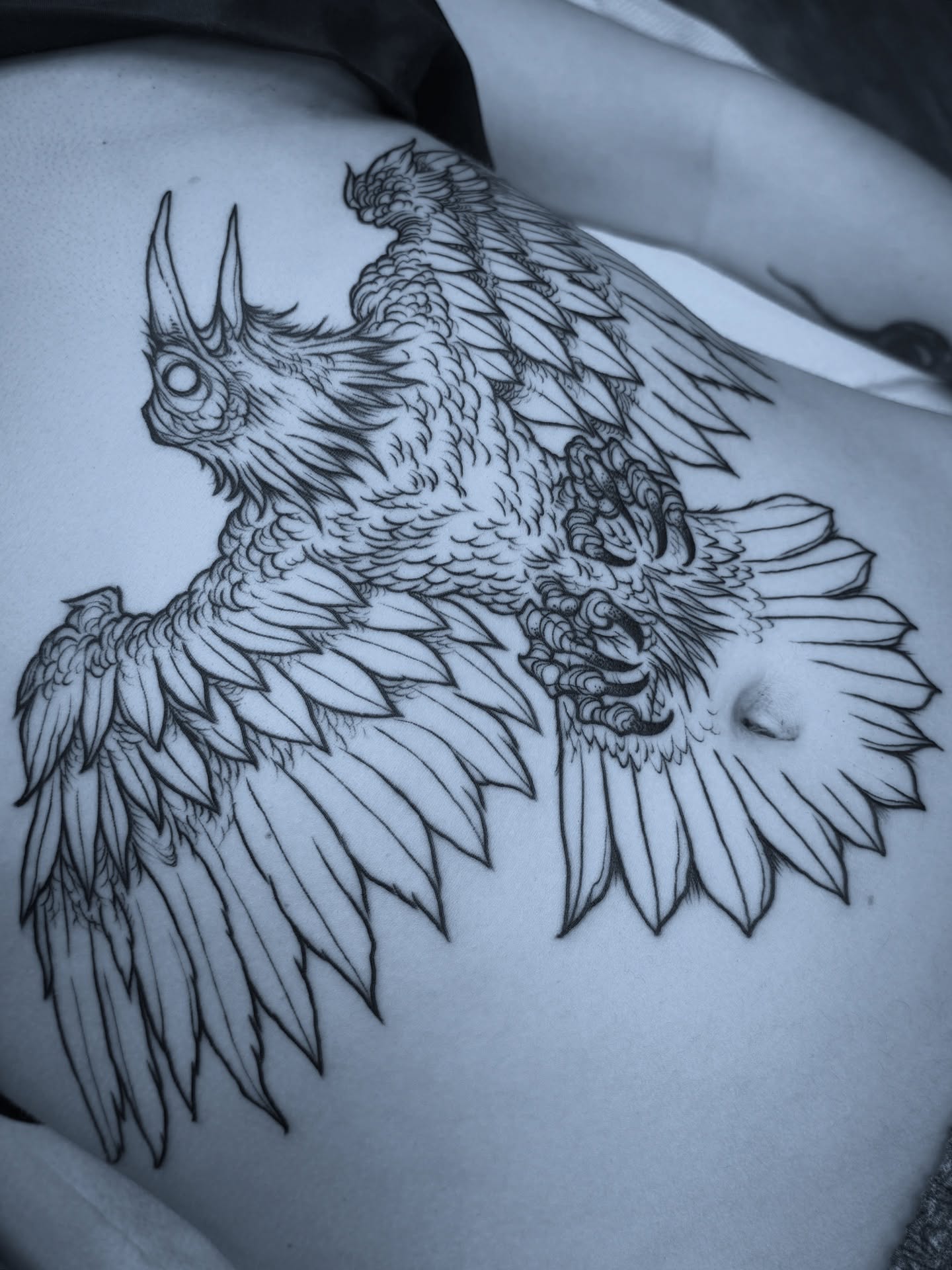 Owl realism tattoo on the shoulder by Michael Langdale
