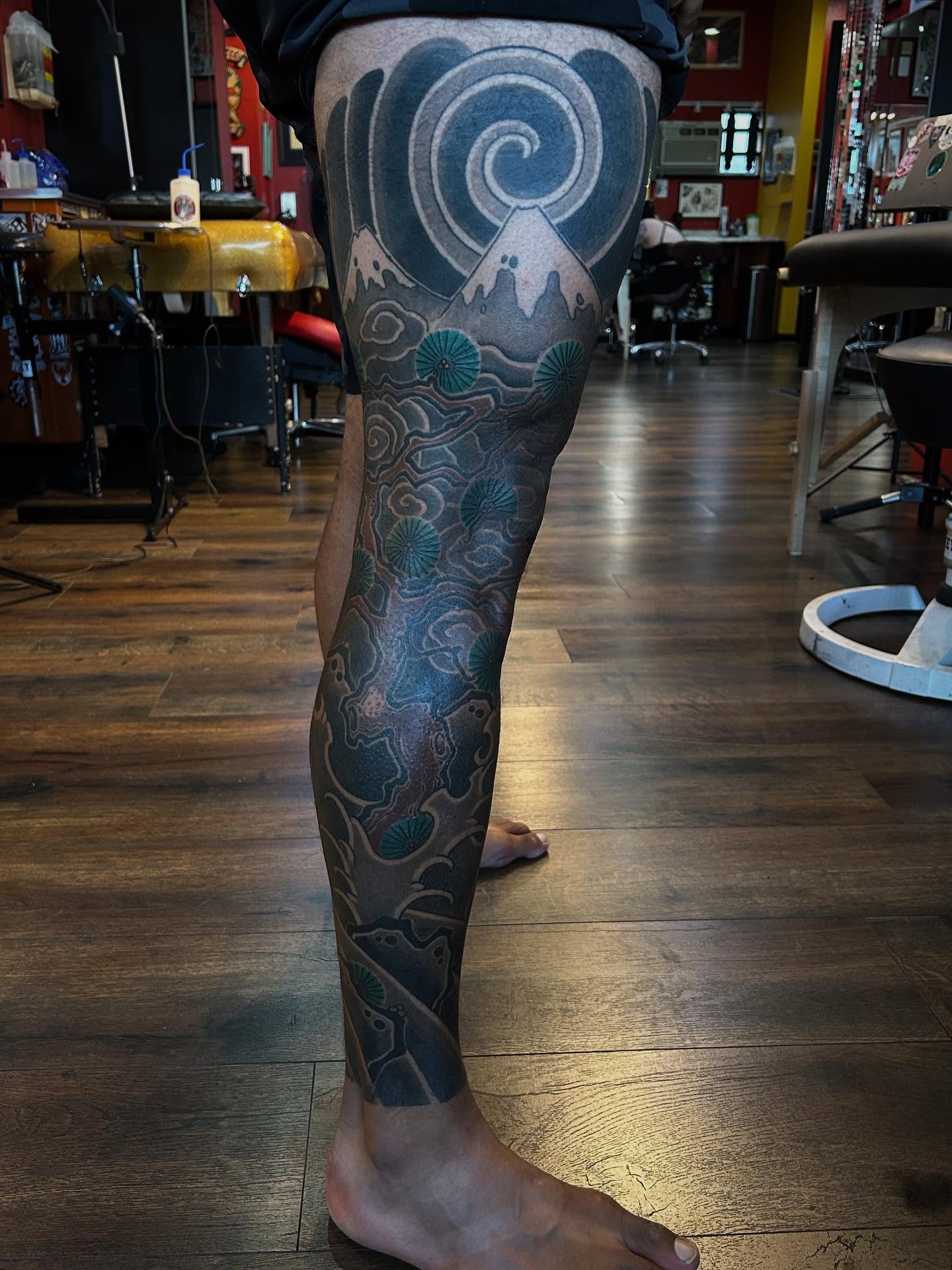 Mountain and clouds japanese irezumi tattoo on the leg by Tako, Seattle, Washington