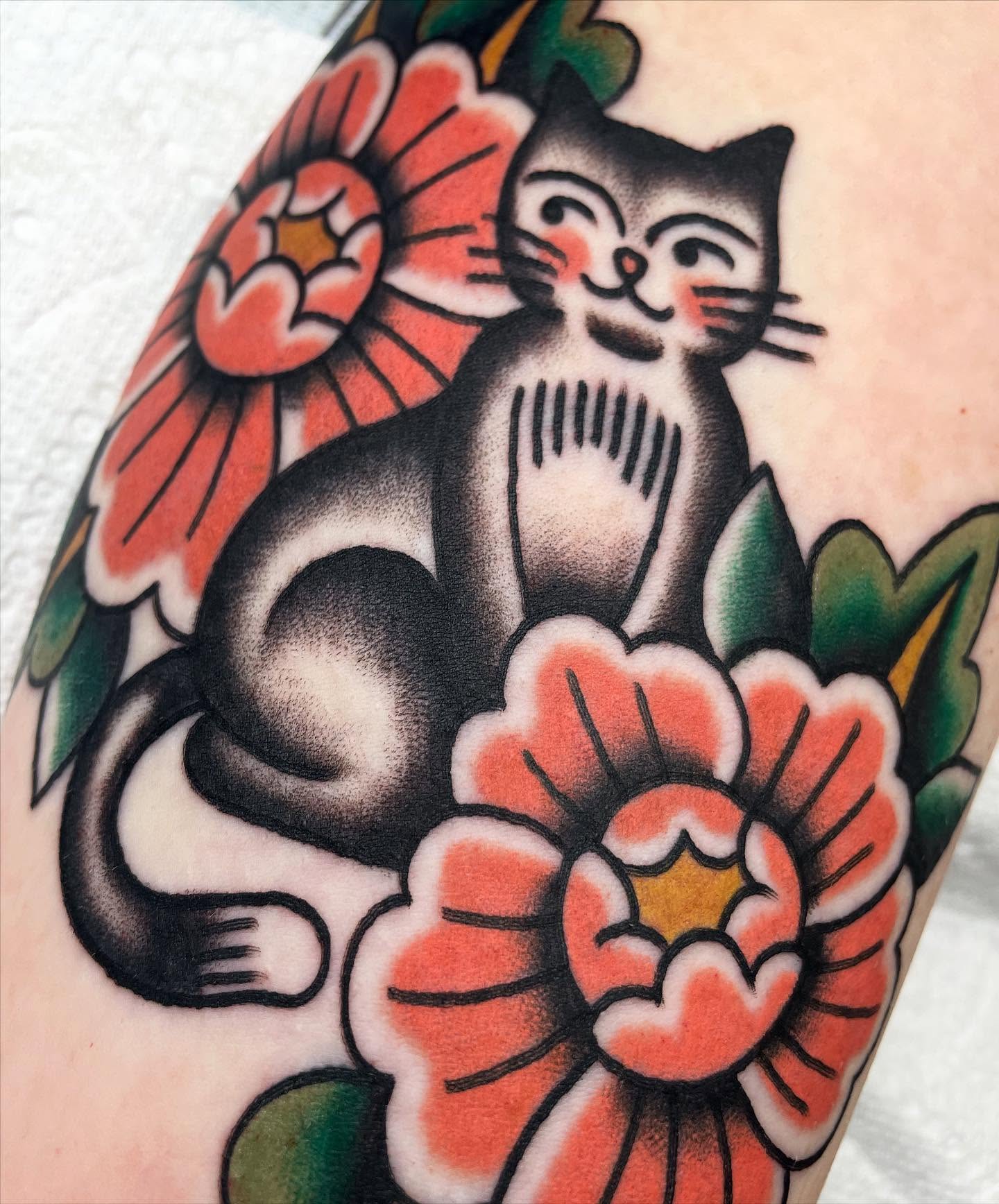 Cat and flowers American traditional tattoo on the forearm by Kat, Sacramento, California