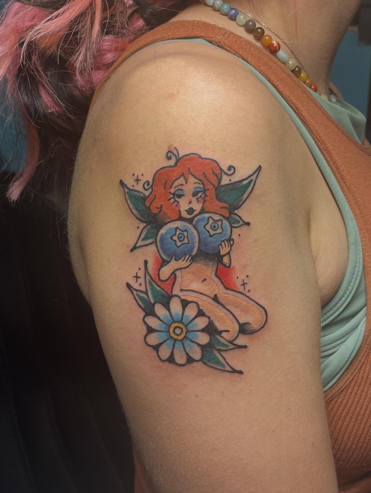 Elf with berries American traditional tattoo on the shoulder by Mark Johnson [Tattoo Artist]