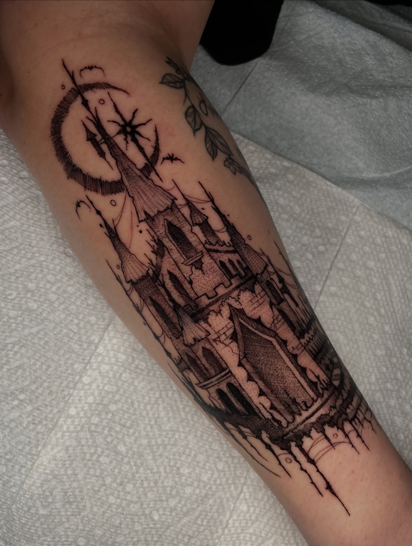Castle realism tattoo on the forearm by Kathryn the Tooth Collector