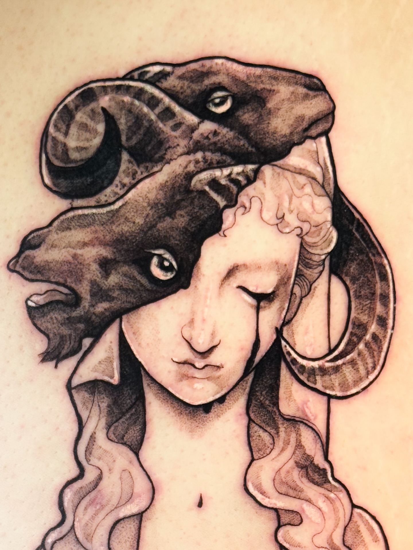 Ram-headed woman realism tattoo on the chest by Yasemin πΉπ·π¬π§ San Jose based tattoo artist