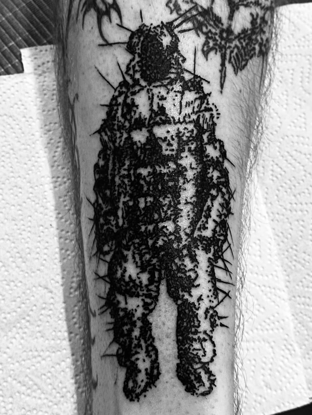 Figure in protective gear sketch tattoo on the forearm by John, Kyiv, Ukraine