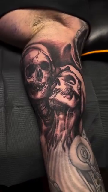Two skulls and anatomical details dark realism tattoo by Jason Oz, Denver, Colorado