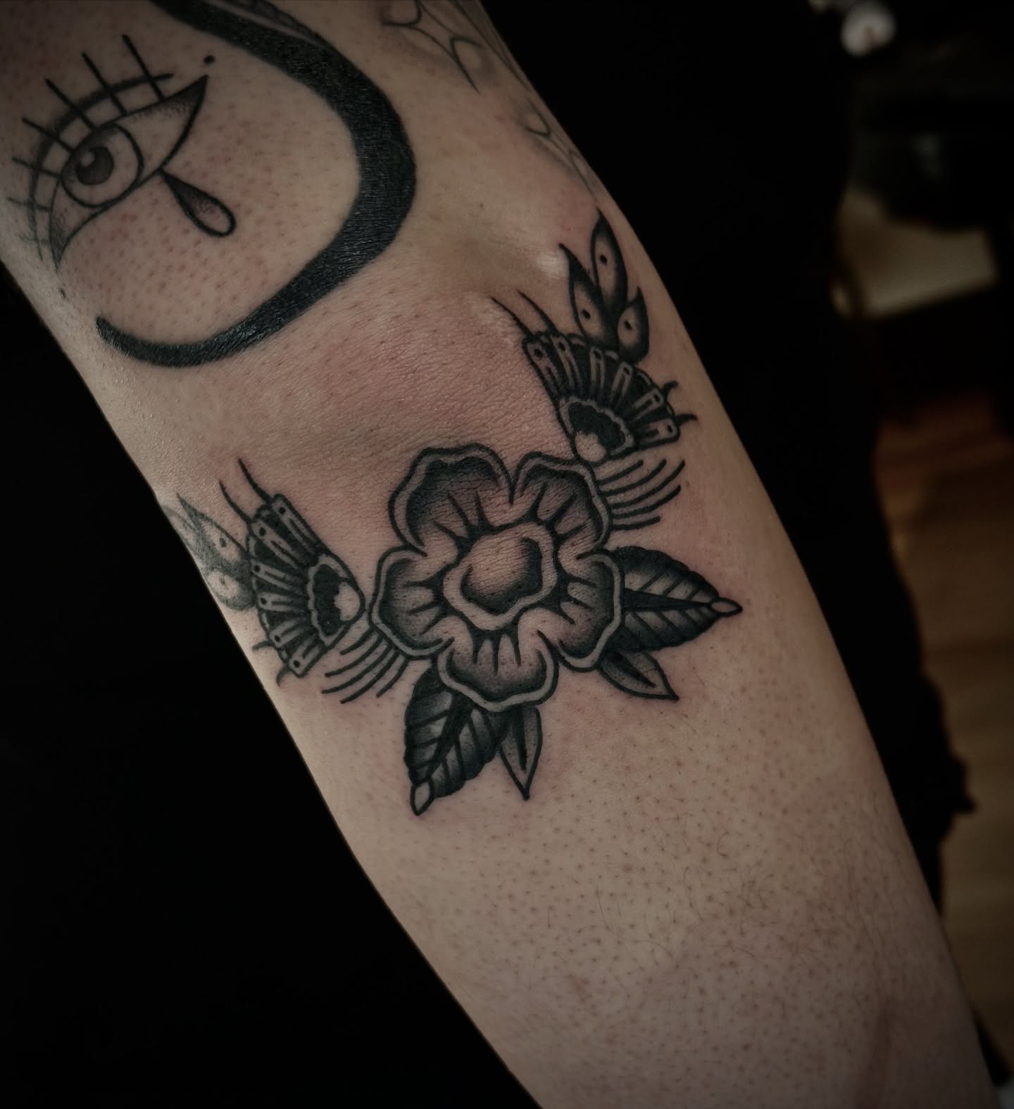 Flower and bird American traditional tattoo on the forearm by Ally noel