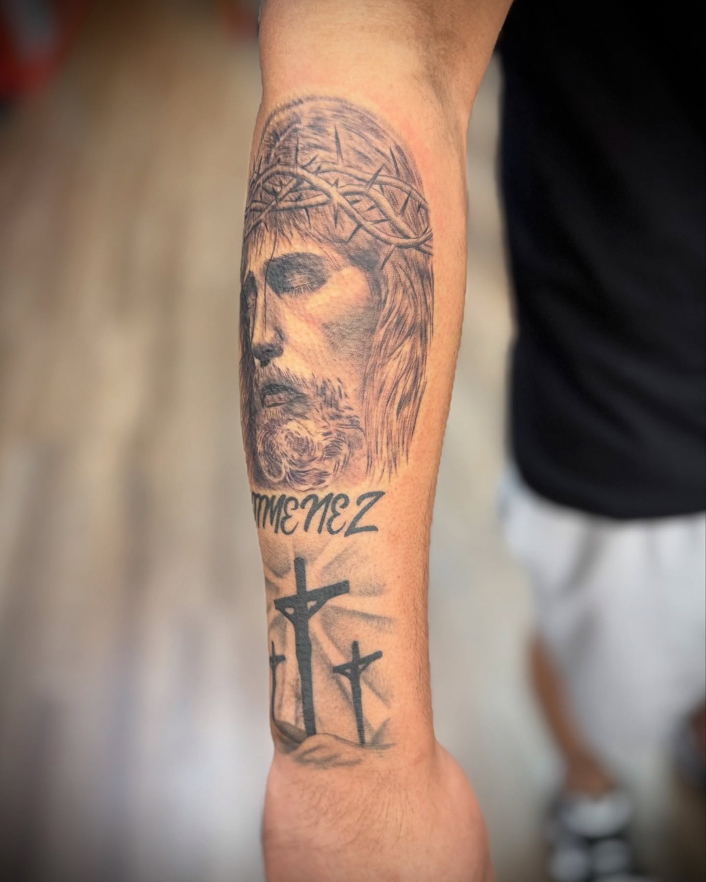 Religious figure realism tattoo on the forearm by Justin Bianchini - New Orleans Tattoo Artist