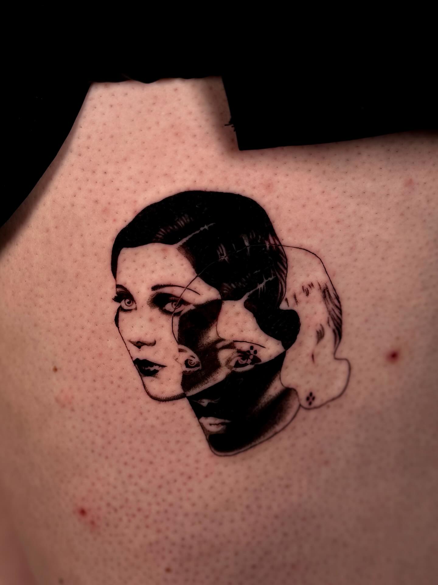 Woman's face dotwork tattoo on the shoulder by Hayley Jude