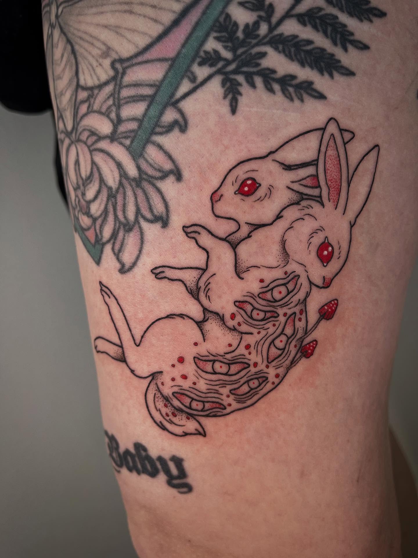 Rabbits and zombie American traditional tattoo on the thigh by Peach ๐, Portland, Oregon