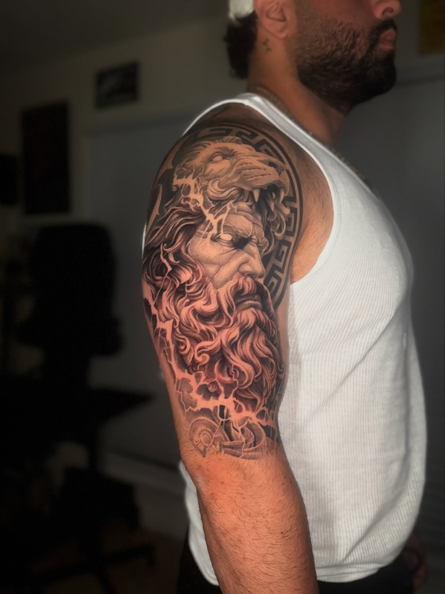 Tattoo by @geo_tatt2 — realism, black_and_grey