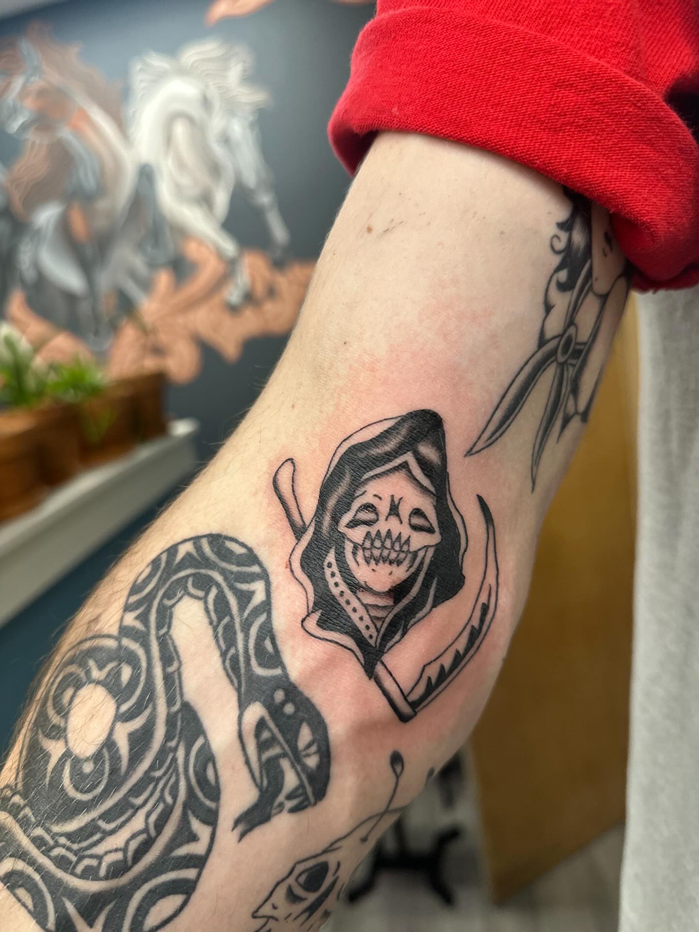 Grim reaper black and grey tattoo on the forearm by rory