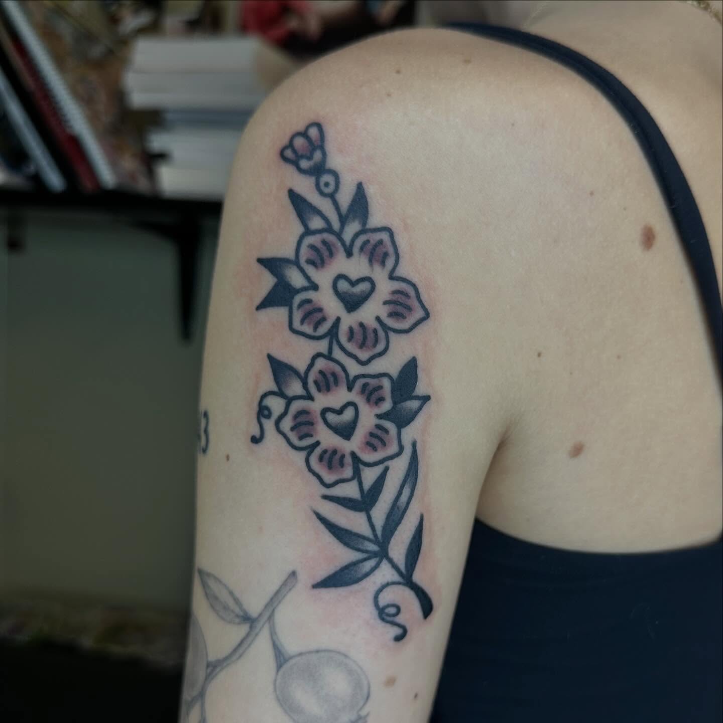 Floral arrangement American traditional tattoo on the shoulder by Keon Ostby, Tempe, Arizona
