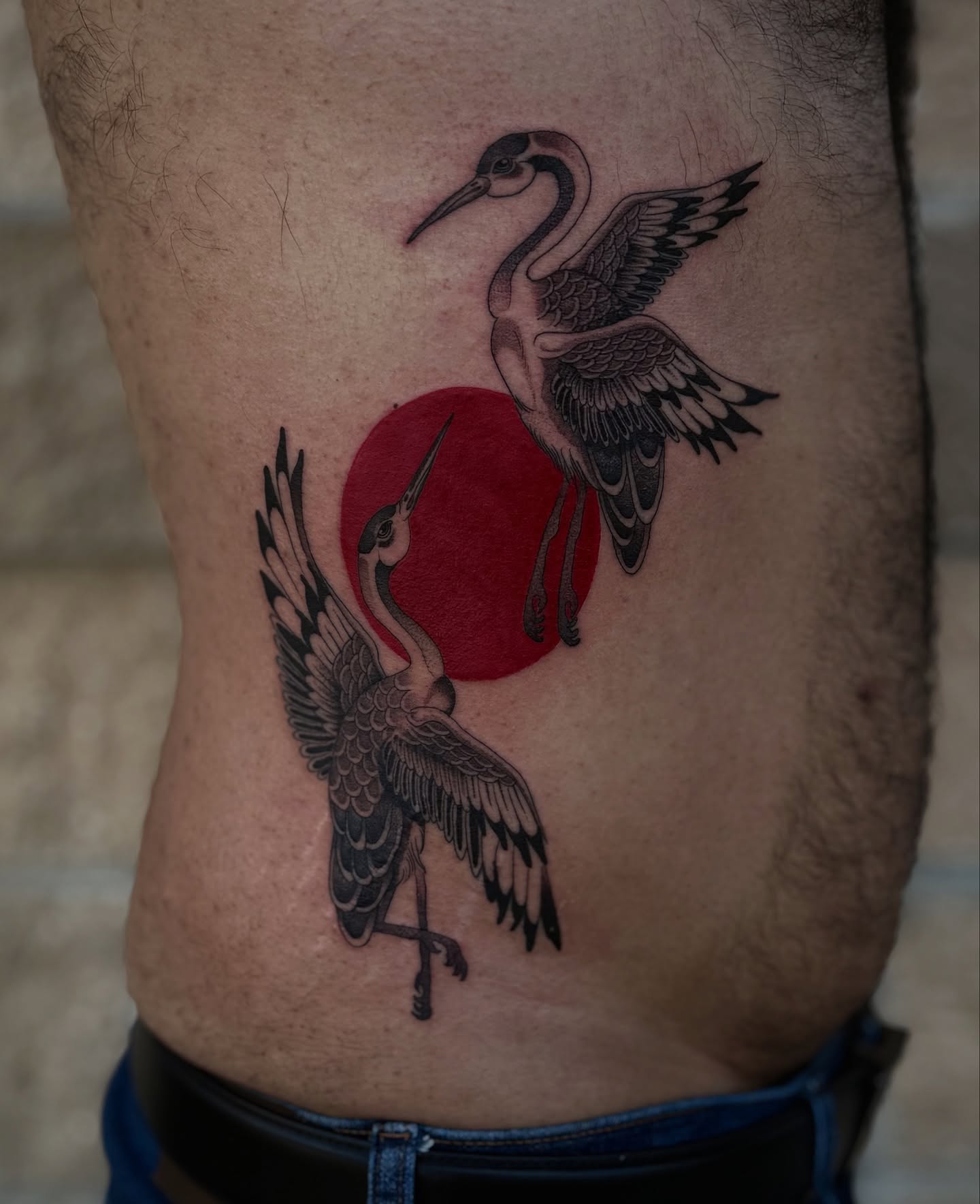Cranes and sun black and grey tattoo on the thigh by K9