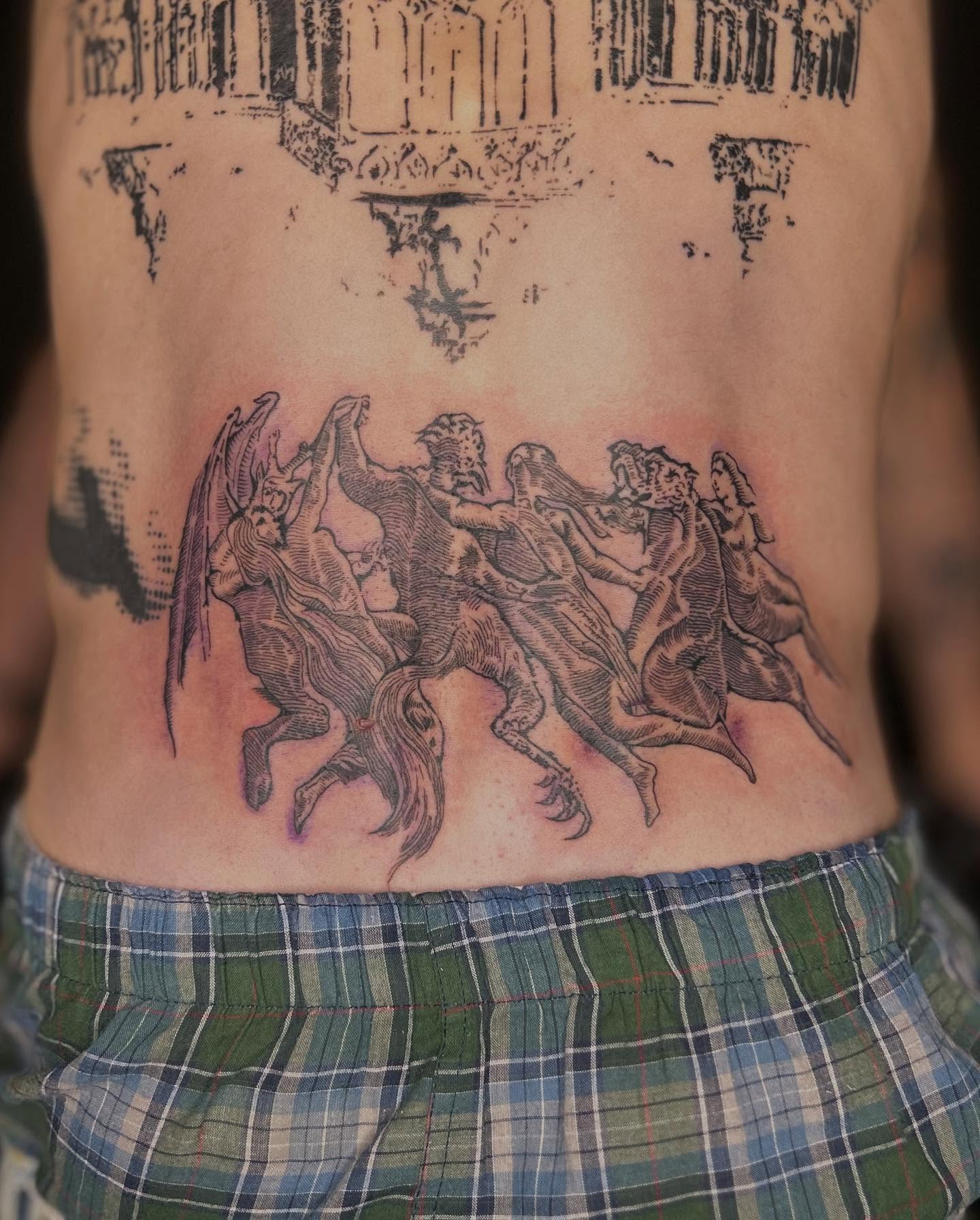 Mythical creatures black and grey tattoo on the ribs by Barro