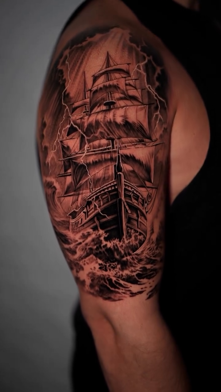 Tall ship in stormy seas realism tattoo by Mark Vata