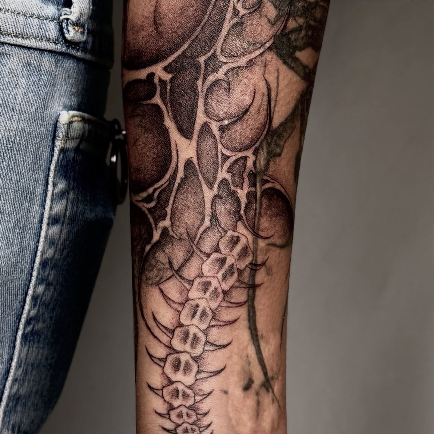 Spine black and grey tattoo on the forearm by V เผ๏ธ ๐๐๐ญ๐ญ๐จ๐จ ๐๐ซ๐ญ๐ข๐ฌ๐ญ