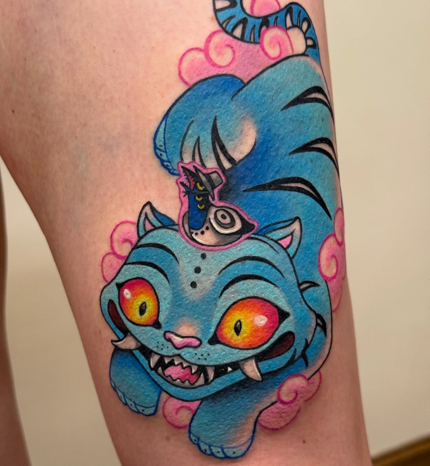 Blue cat new school tattoo on the thigh by vic