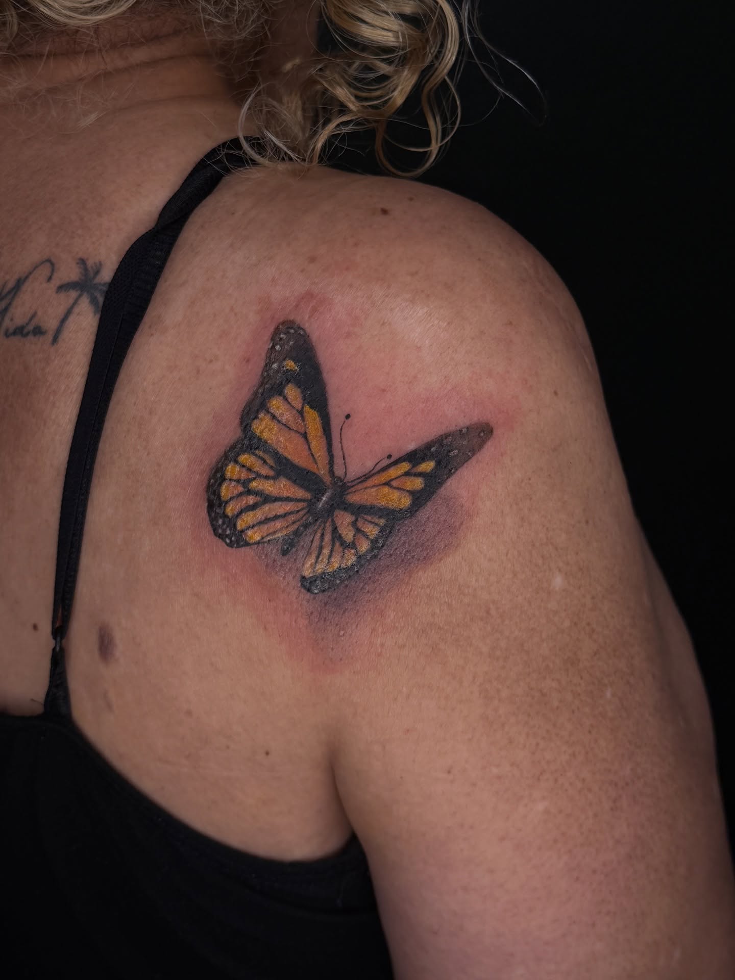 Monarch butterfly realism tattoo on the shoulder by Marcus