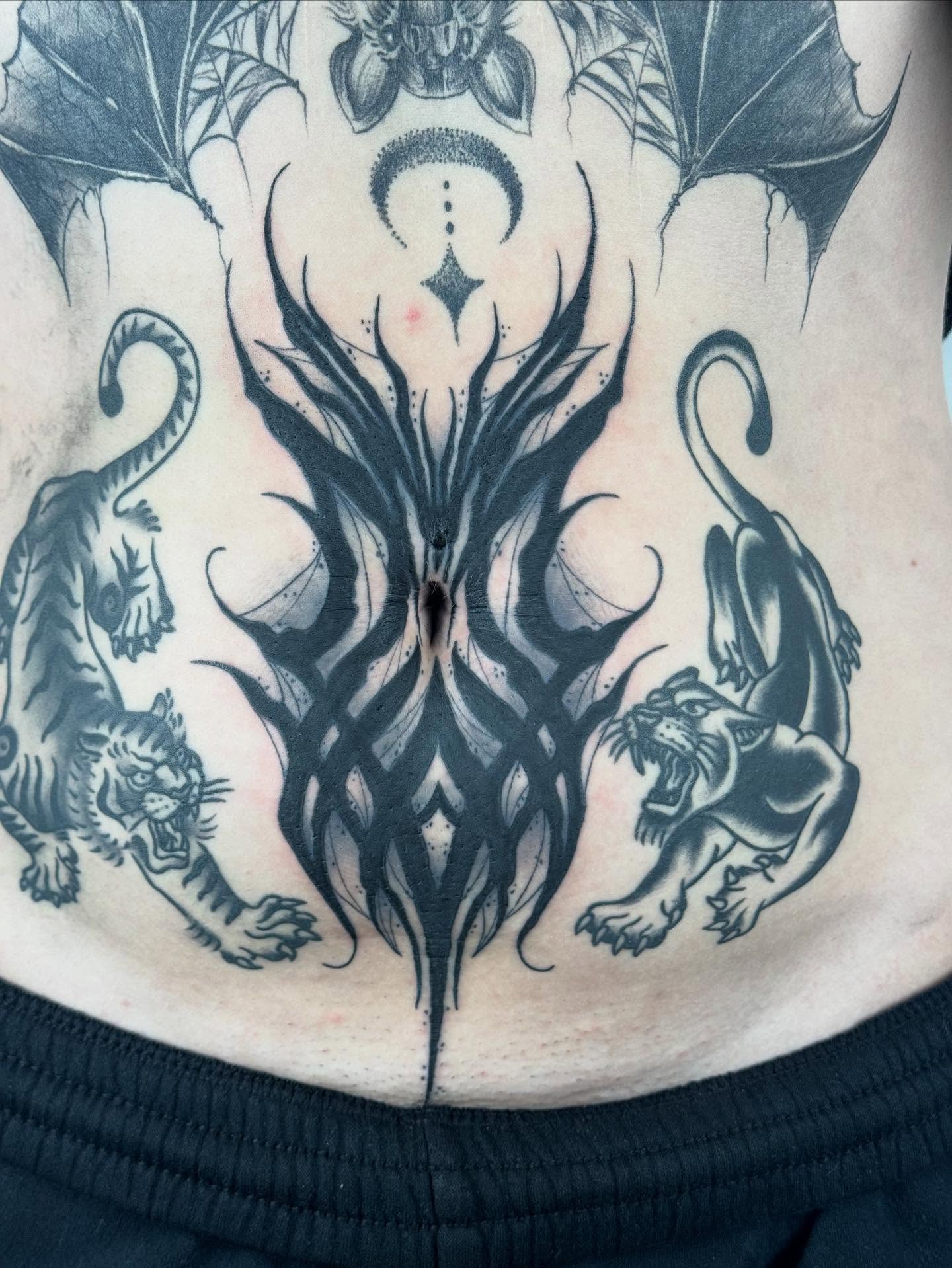 Mythical creatures tribal tattoo on the torso by π©πͺπ¬