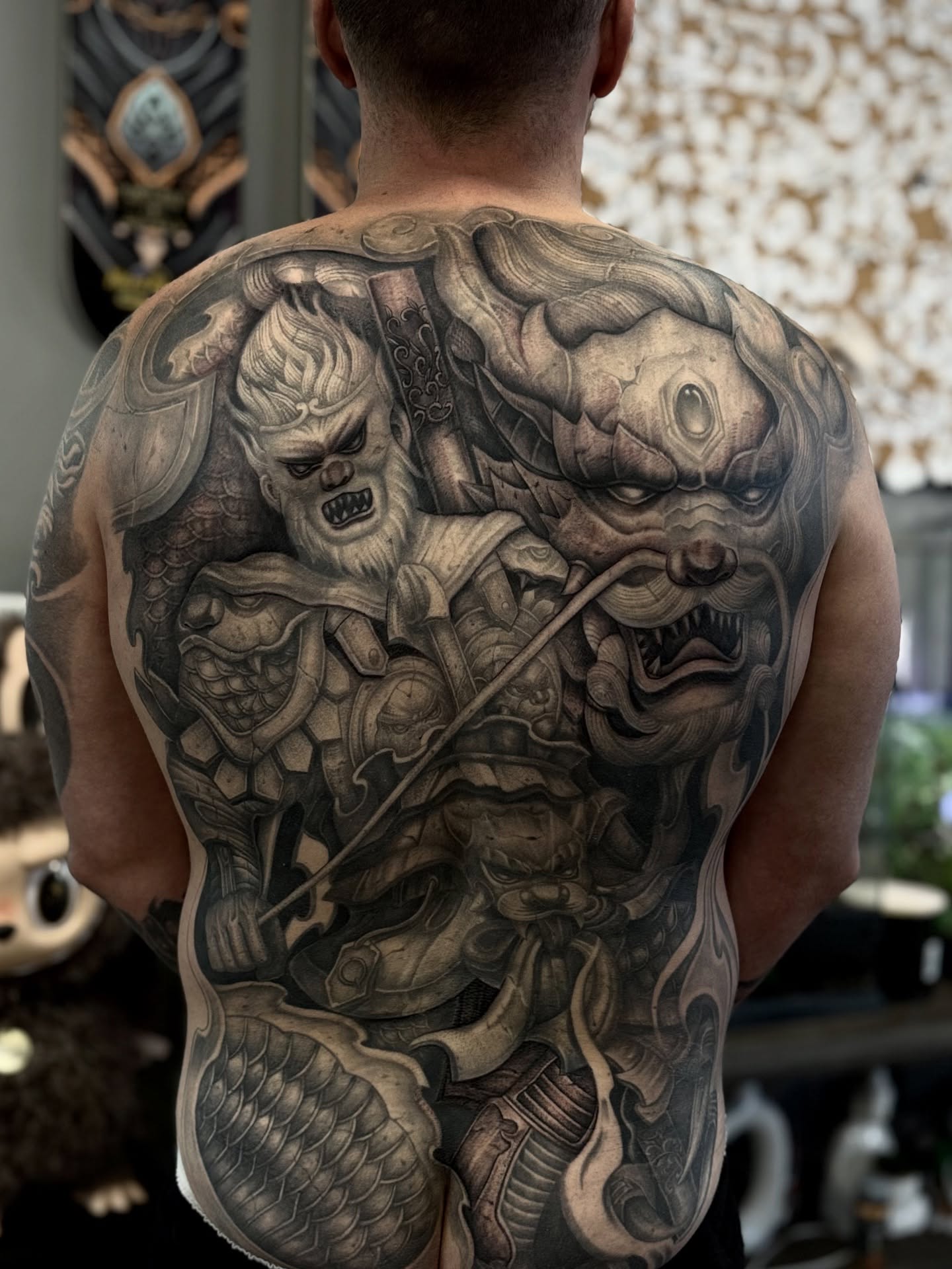 Warrior and dragon realism tattoo on the back by Anh Nguyen