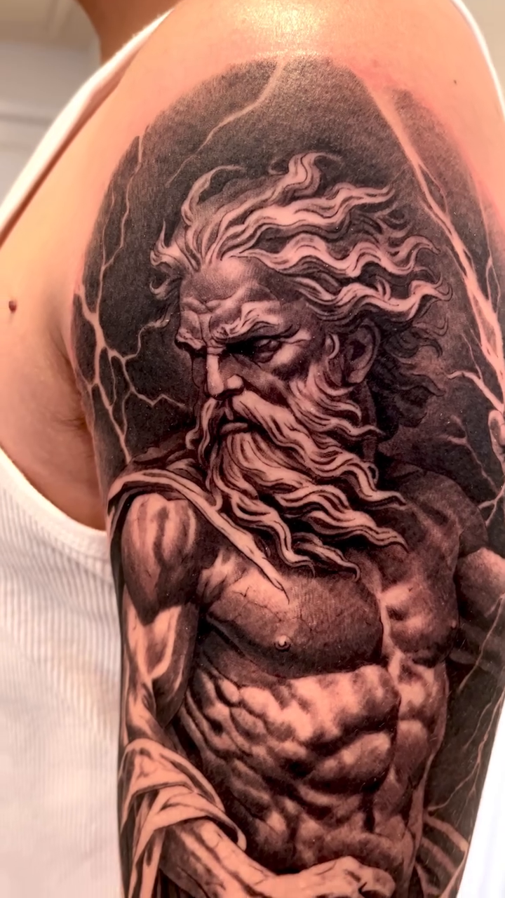 Zeus realism tattoo by Carlos Macedo Tattoo