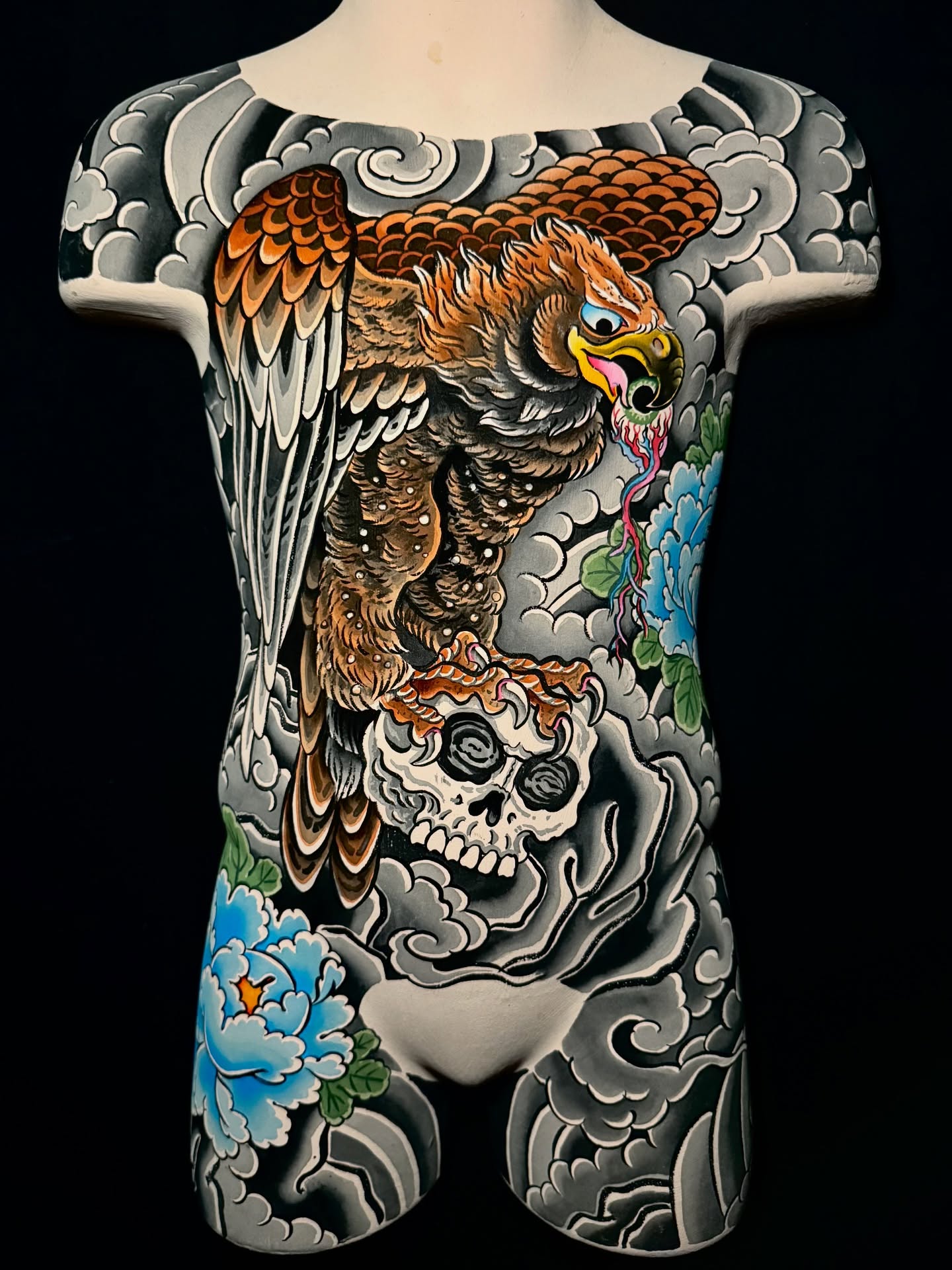 Hawk and skull American traditional tattoo on the torso by Leif Hansen