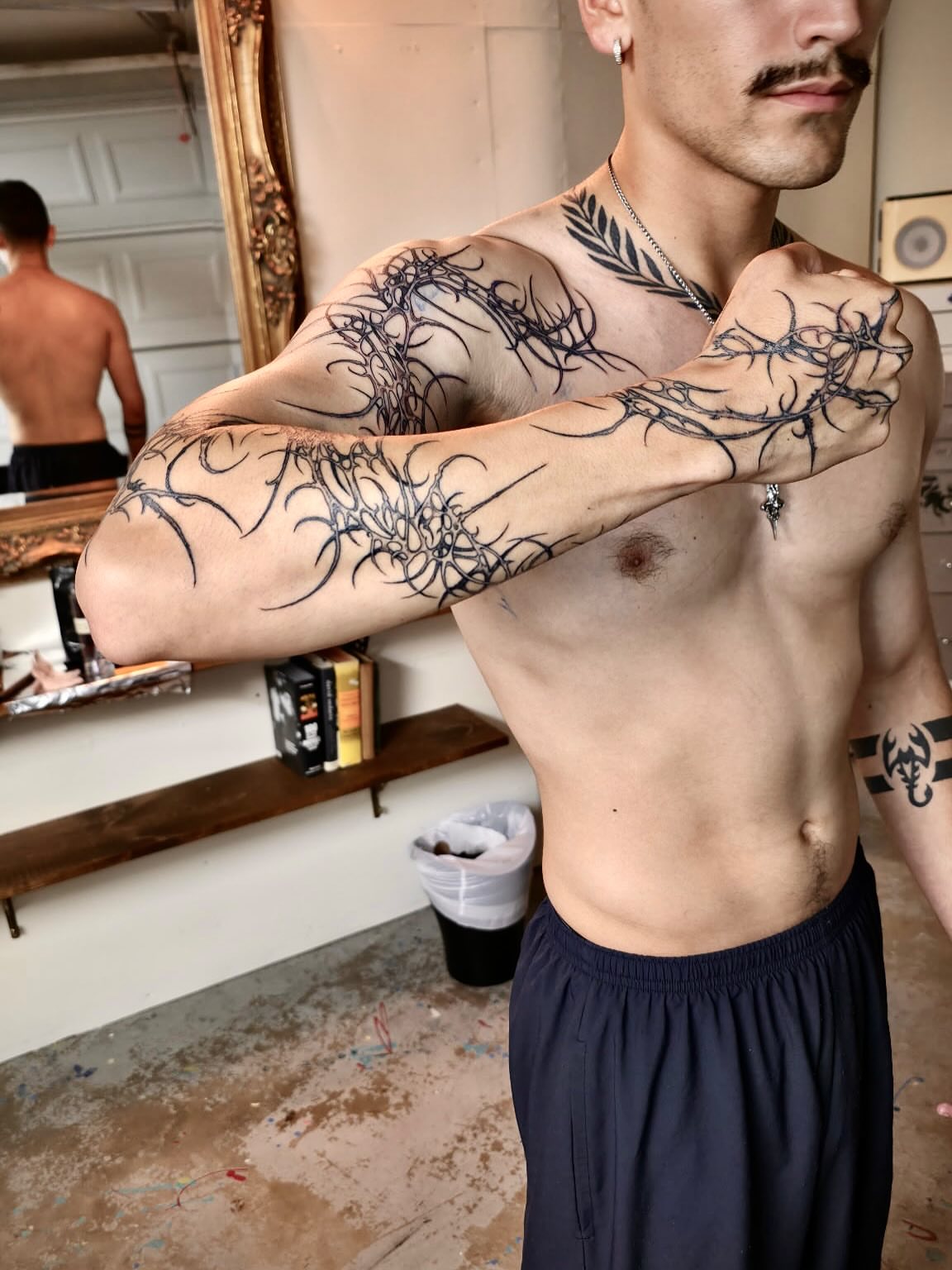 Thorn-like pattern black and grey tattoo by Quin Walker