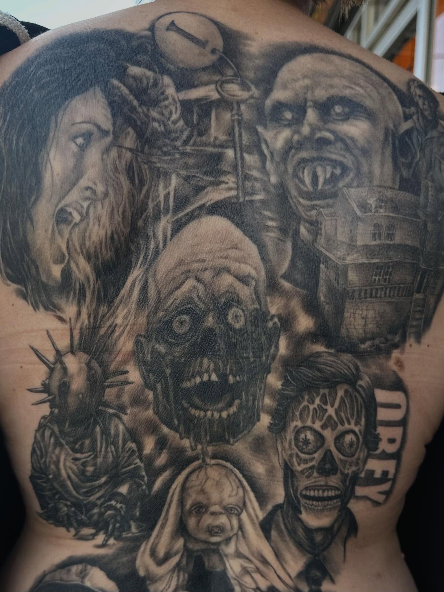 Horror movie characters realism tattoo on the back by Alan