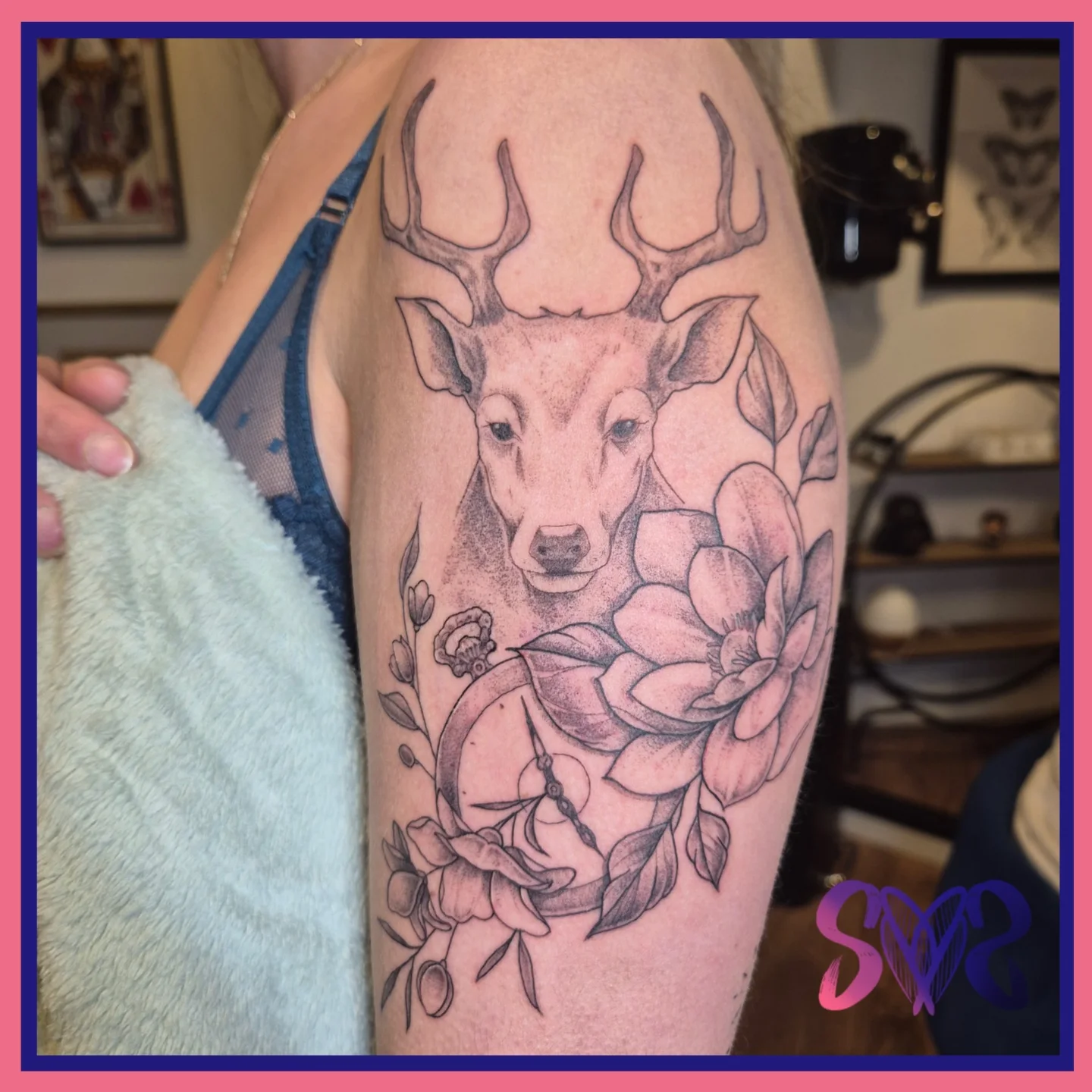 Deer and flowers realism tattoo on the forearm by Sooz, Tours, Centre-Val de Loire
