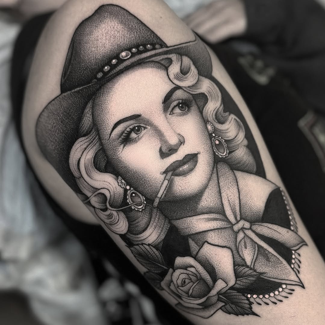Cowgirl pin-up with cigarette and roses realism tattoo on the forearm by Luna Lucero