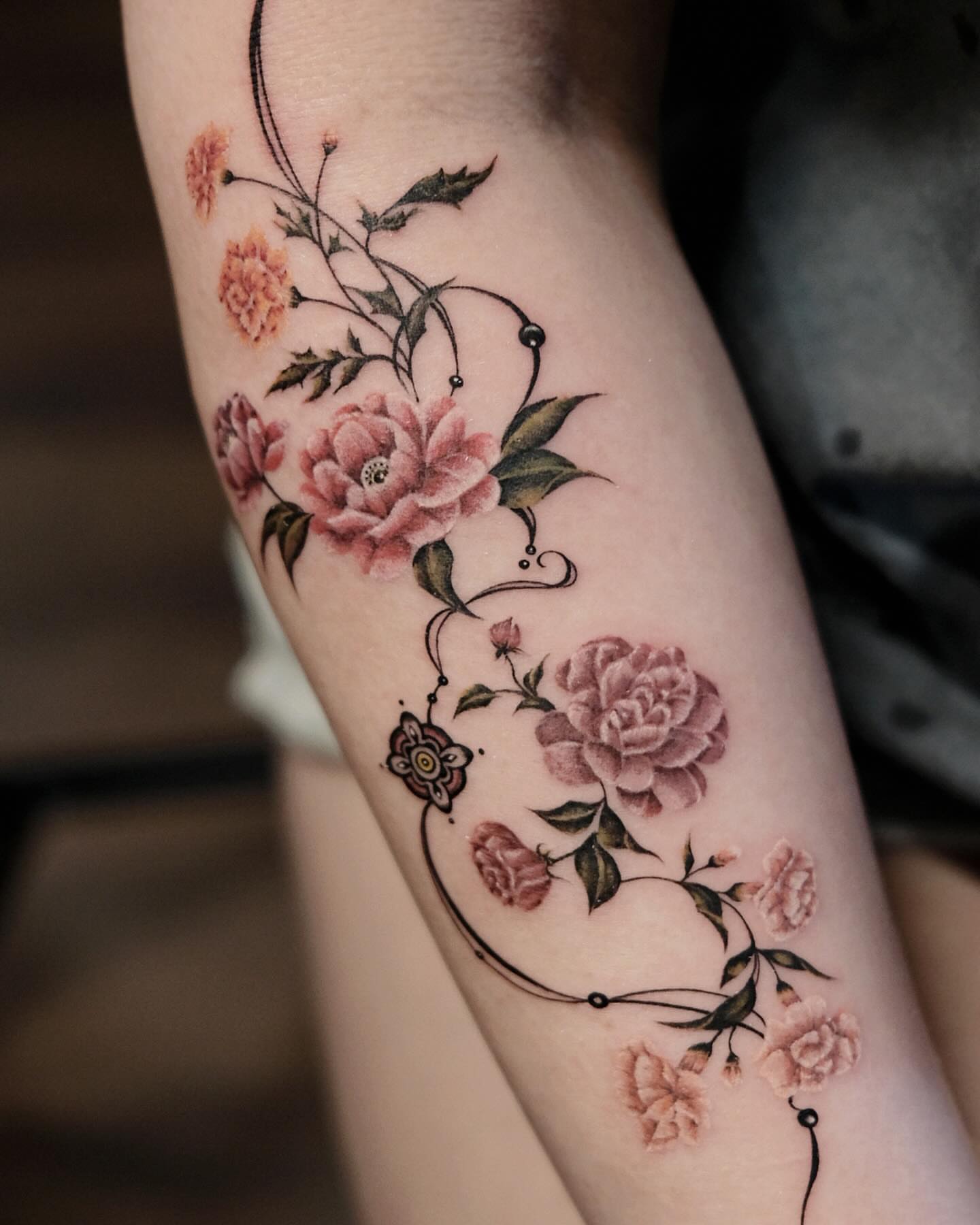 Floral arrangement realism tattoo on the forearm by 애박 ⋆⁺₊ ₊⁺⋆ Aebak