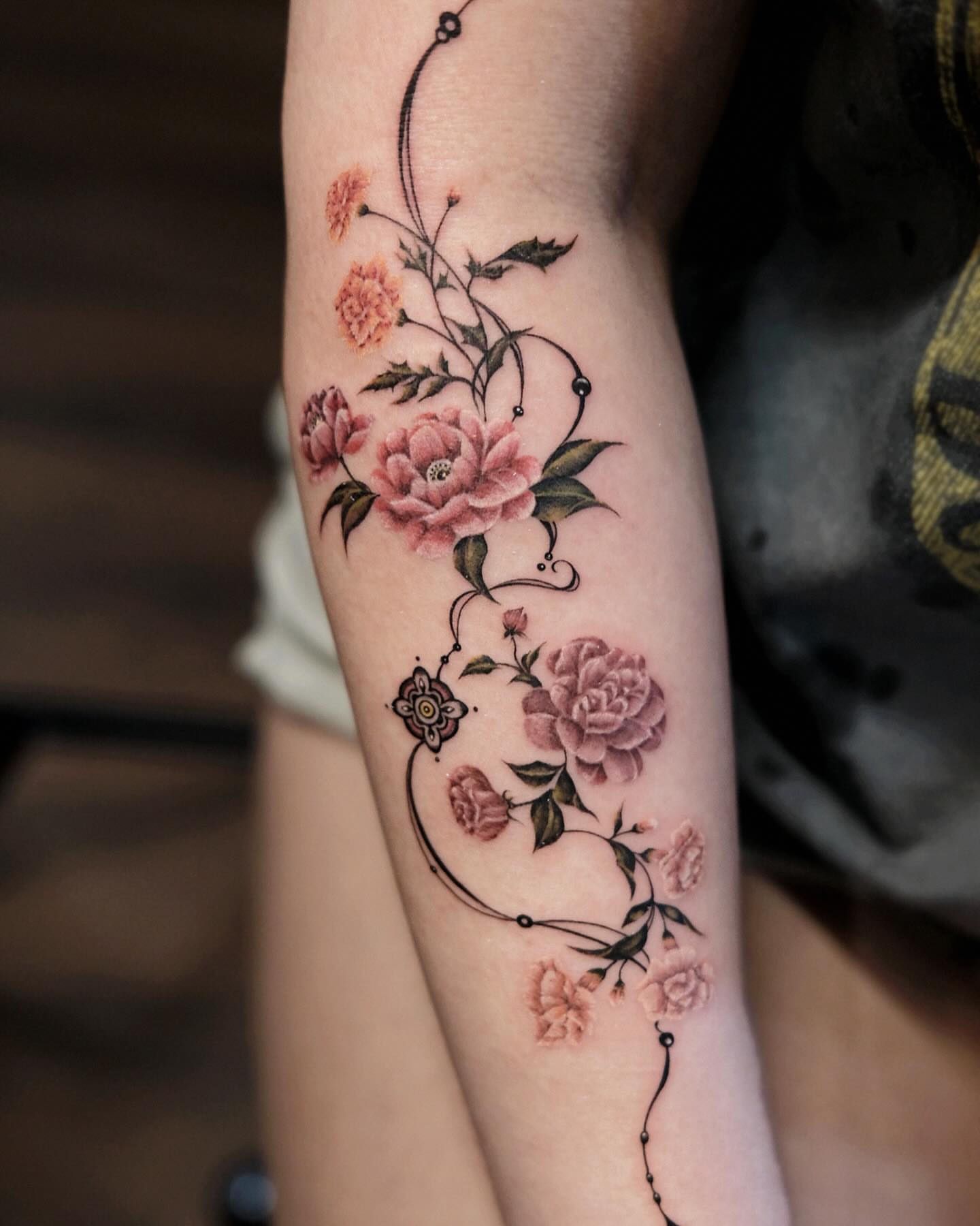 Peony flowers realism tattoo on the forearm by 애박 ⋆⁺₊ ₊⁺⋆ Aebak