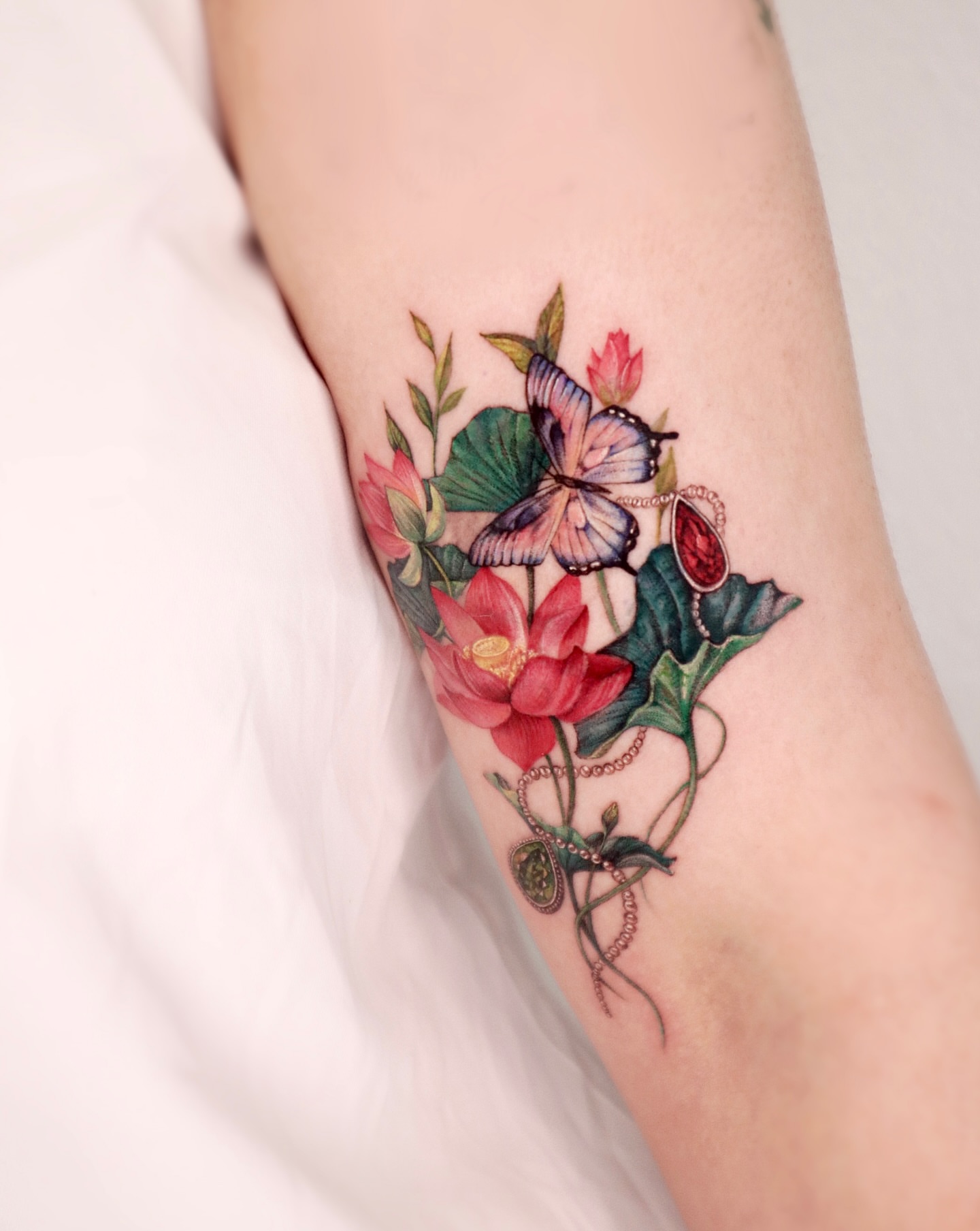 Tattoo by @miiu_tattoo — realism, watercolor