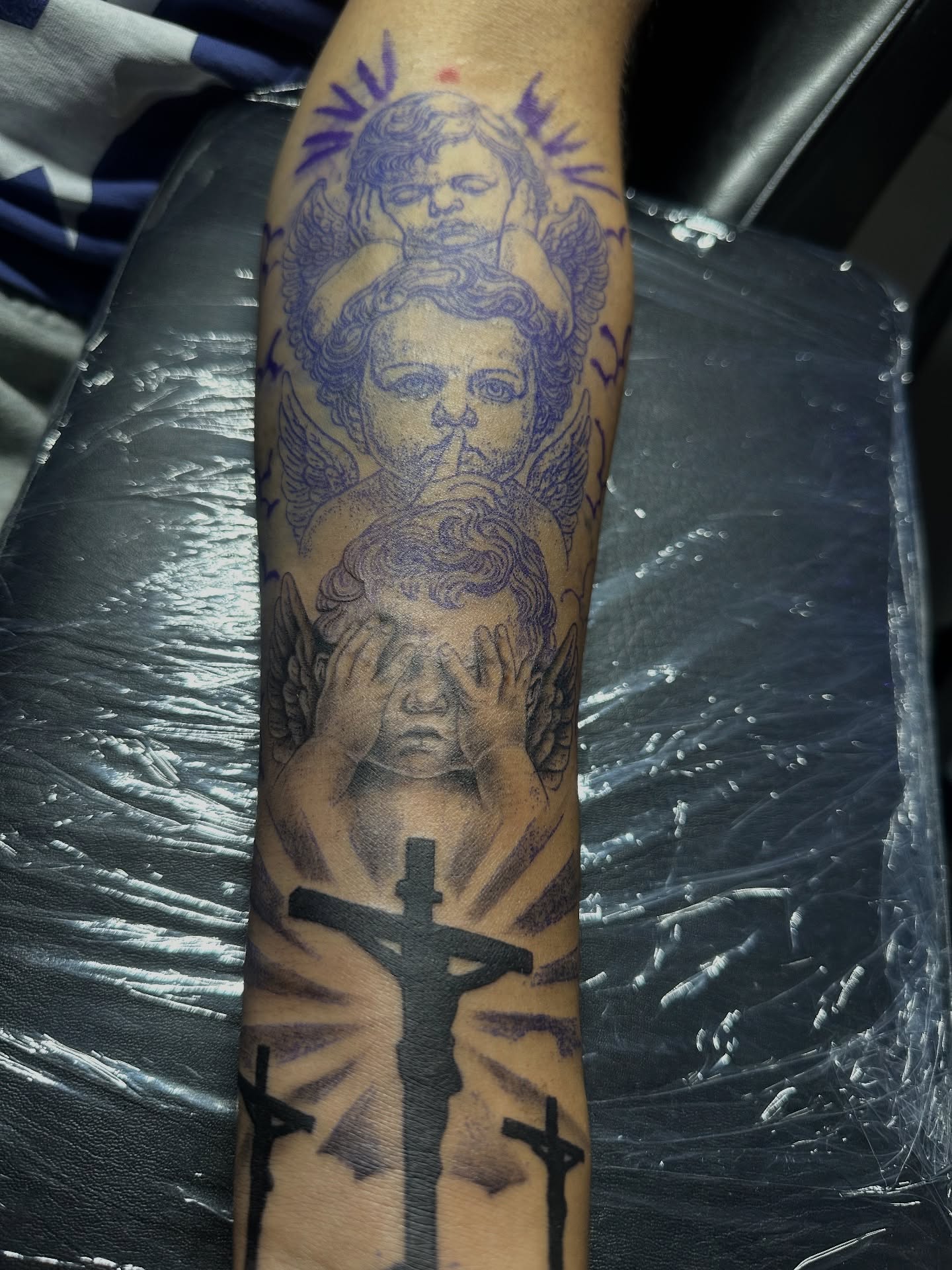 Religious figures black and grey tattoo on the forearm by Chris (Pikasso)
