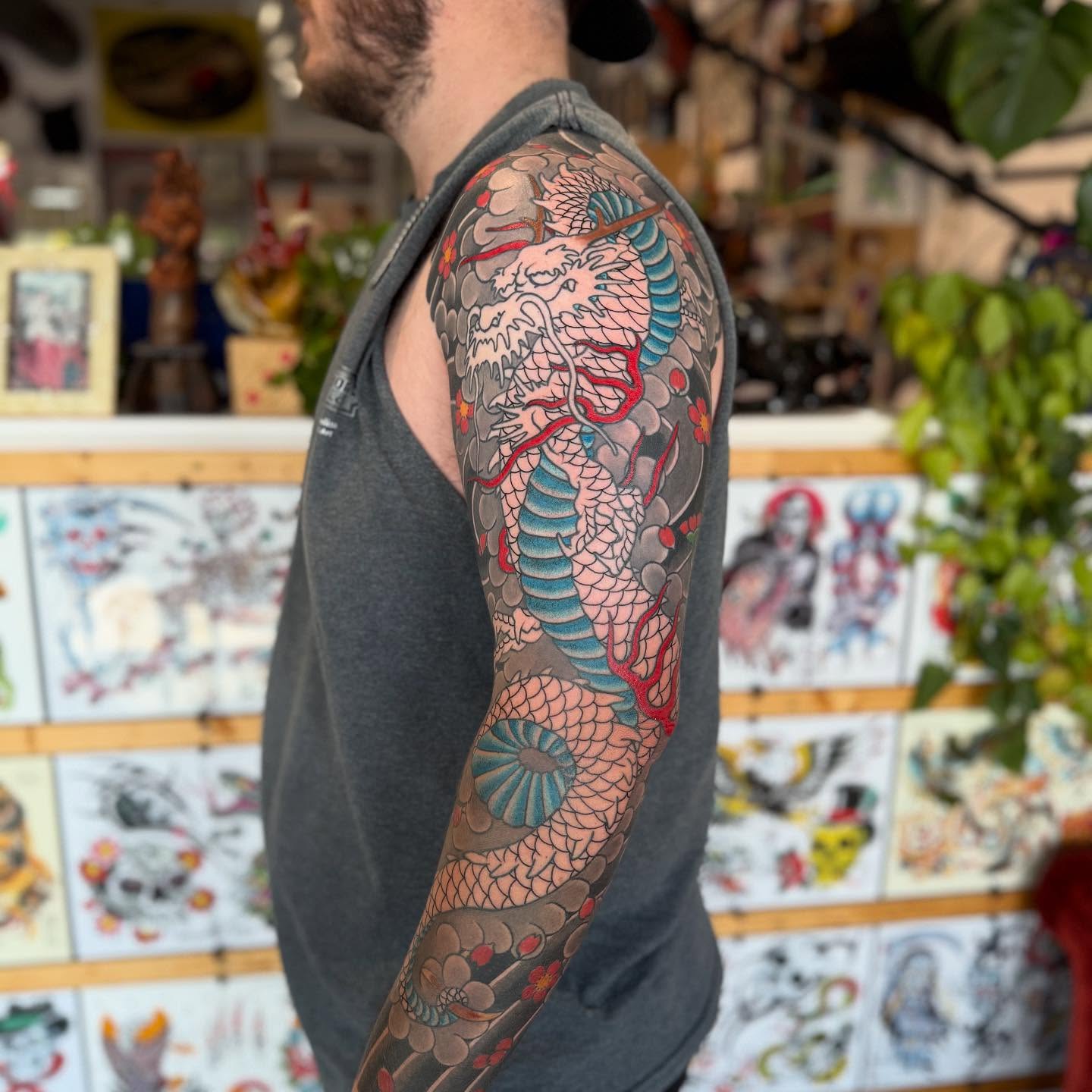 Dragon japanese irezumi tattoo on the upper arm by Jason Eisenberg