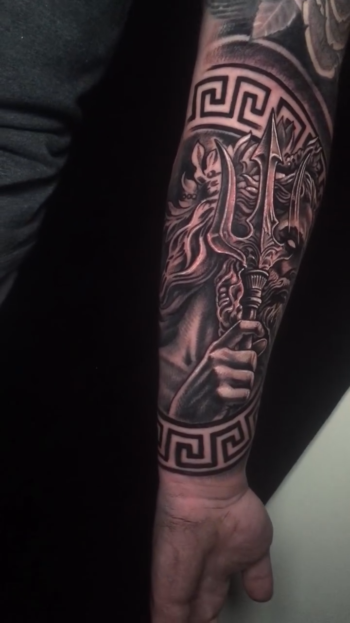 Poseidon with trident realism tattoo by Jose Calderon