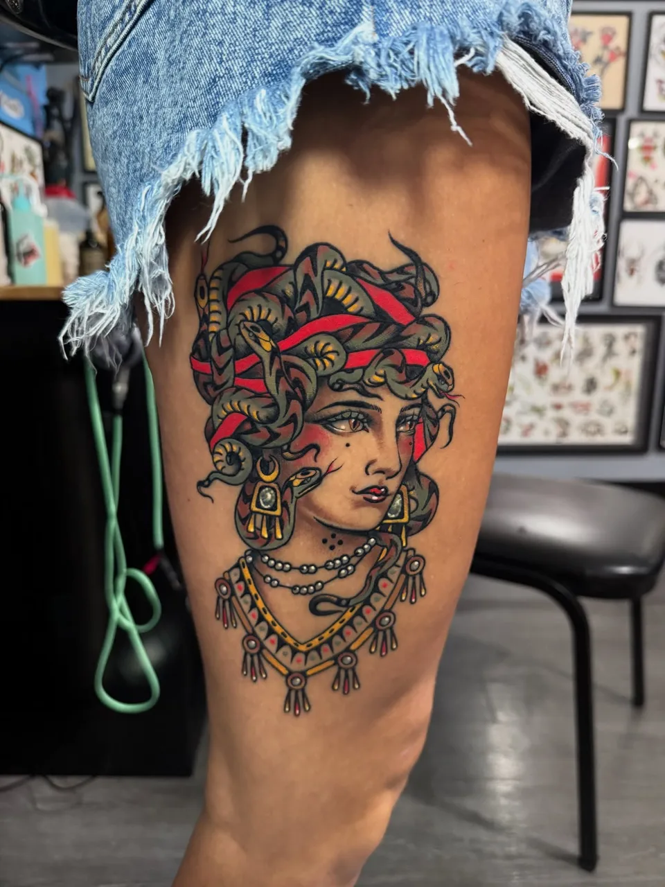 Medusa American traditional tattoo on the thigh by Lauren Vandevier