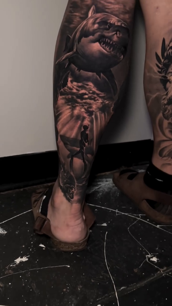 Tattoo by @tattoo_ravay — realism, black_and_grey